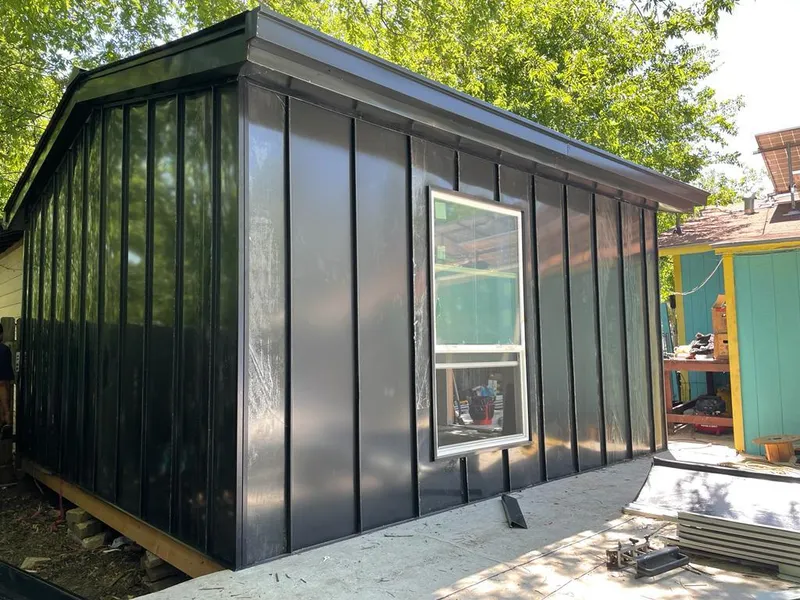 Black standing seam metal wall panels for Roof Inspection in Edgewood