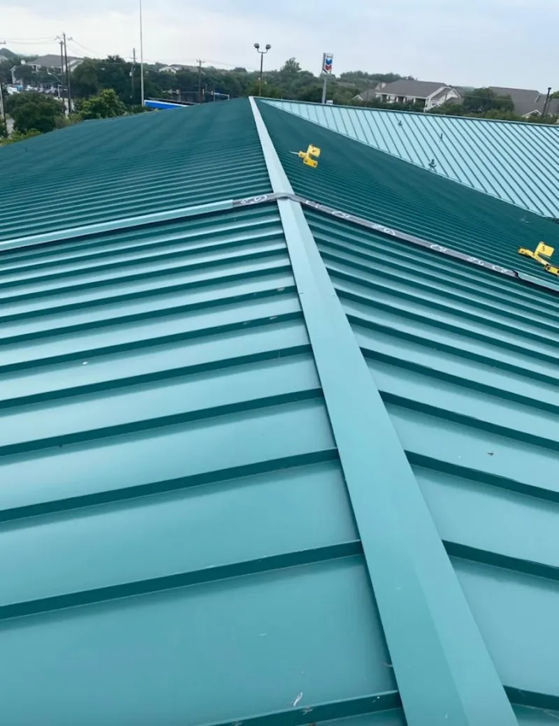Green commercial metal roof ridge and valley for Metal Roof Repair in Edgewood
